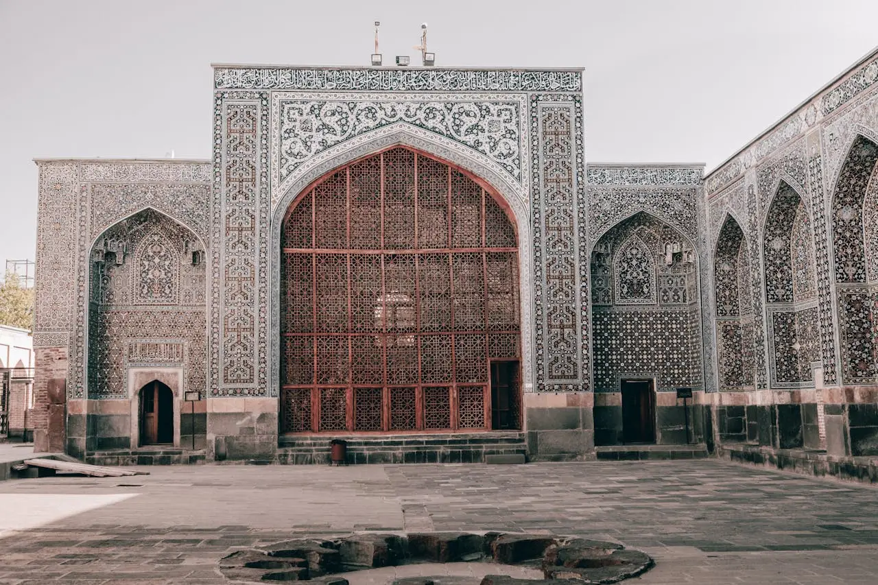 Explore the intricate details of Persian Islamic architecture in this historic Iranian landmark image.